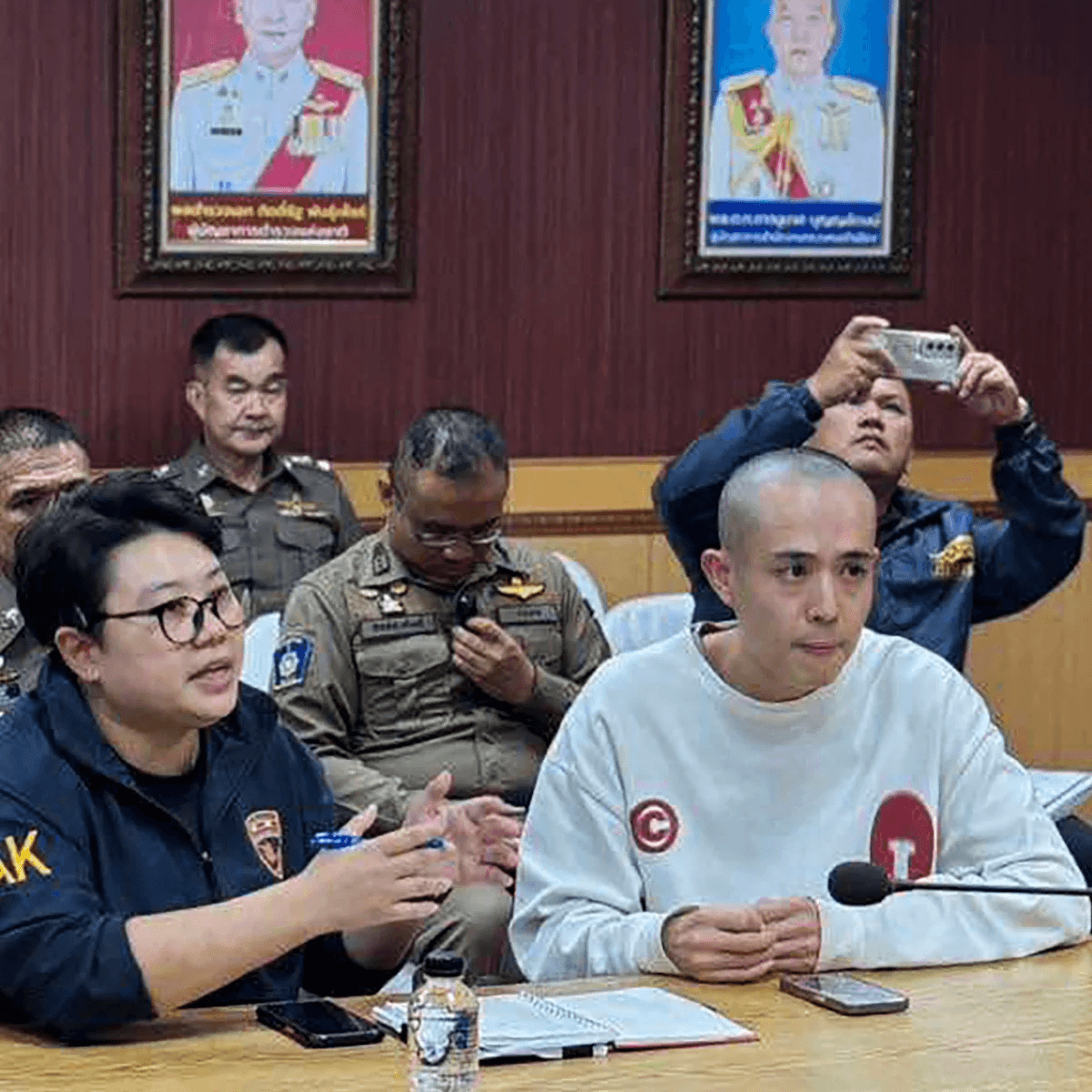 Wang Xing Case: The Sinister Job Offer Trap 4 Wang Xing with Thai police officers in Mae Sot district, via The Guardian