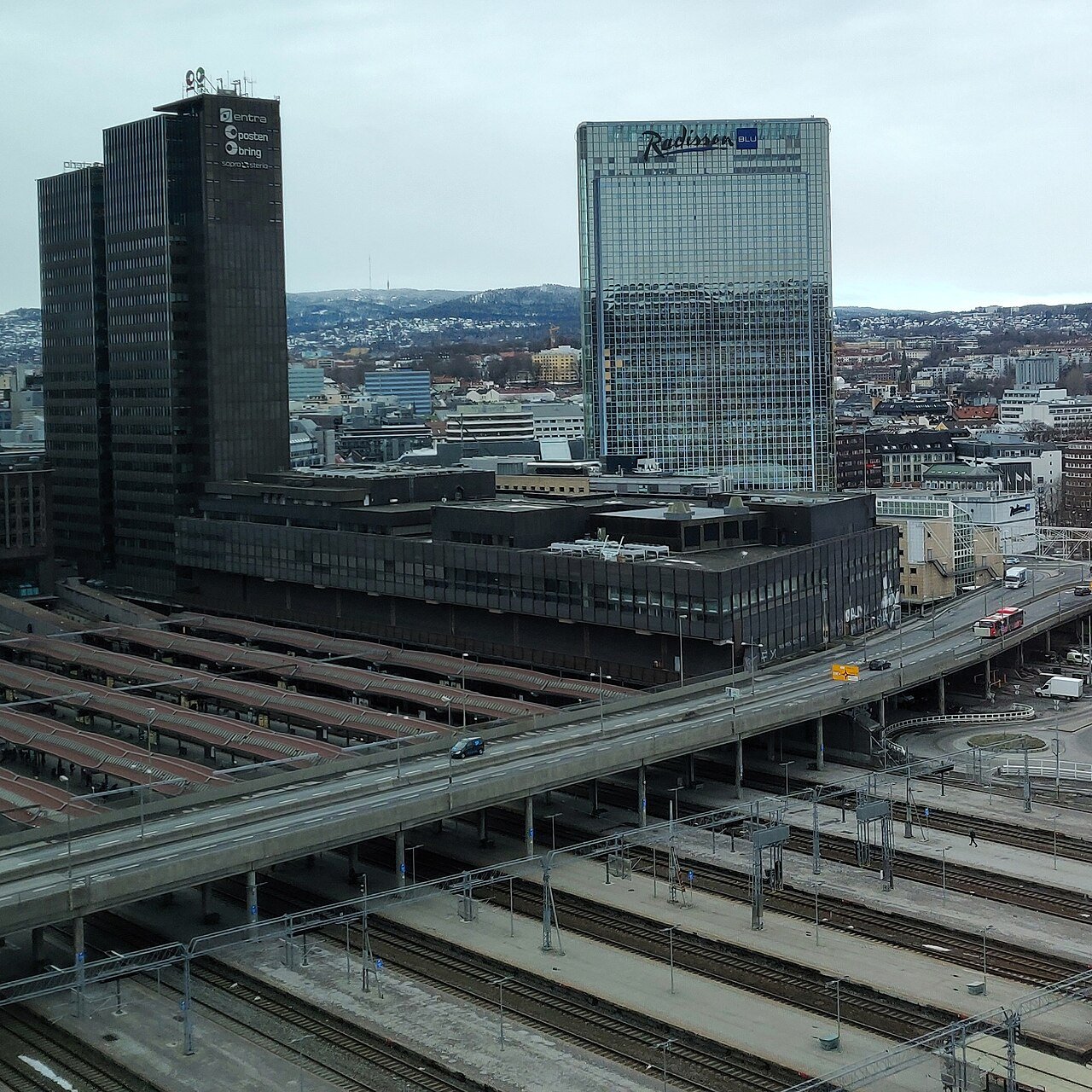 Jennifer Fairgate: The Oslo Plaza Hotel Mystery of Room 2805 4 Oslo Plaza and the Postgirobygget seen across the platforms of Oslo Central Station