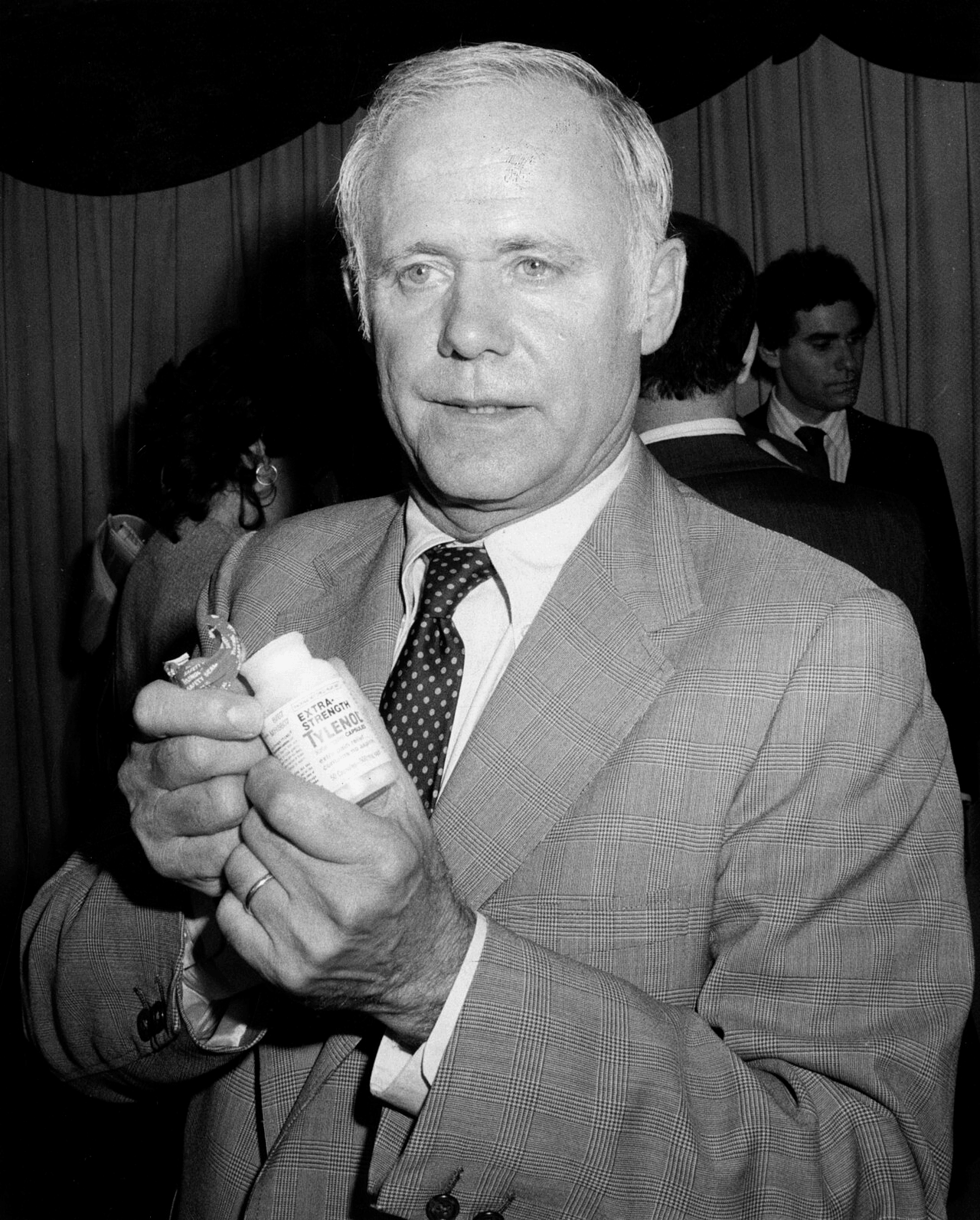 The 1982 Chicago Tylenol Murders 3 Chairman and CEO of Johnson & Johnson James E. Burke holding Tylenol bottle in 1982